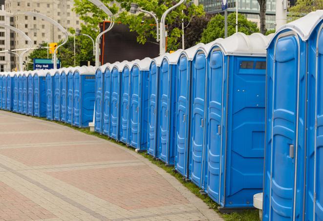 a row of sleek and modern portable restrooms at a special outdoor event in Heathrow